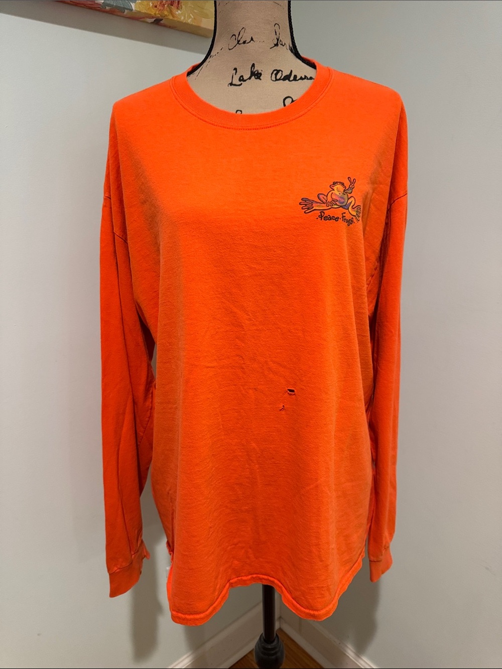 Vintage Men's Long-Sleeve Crewneck Shirt in Bright Orange Has small hole.